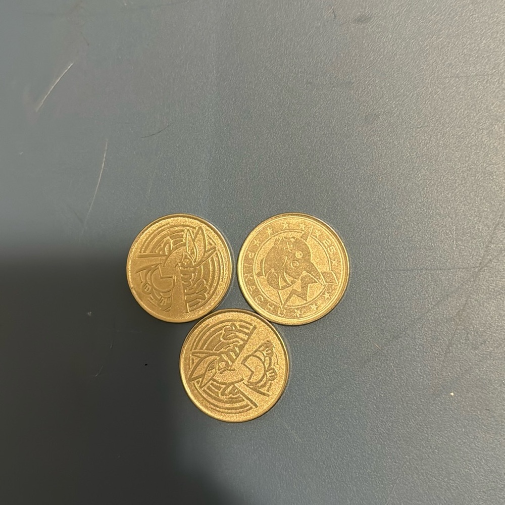 3 Silver Pokémon coins